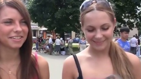 Sassy girls are fucking in the park in a threesome