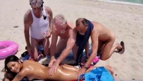 Nikki Kay meets horny old farts at the beach